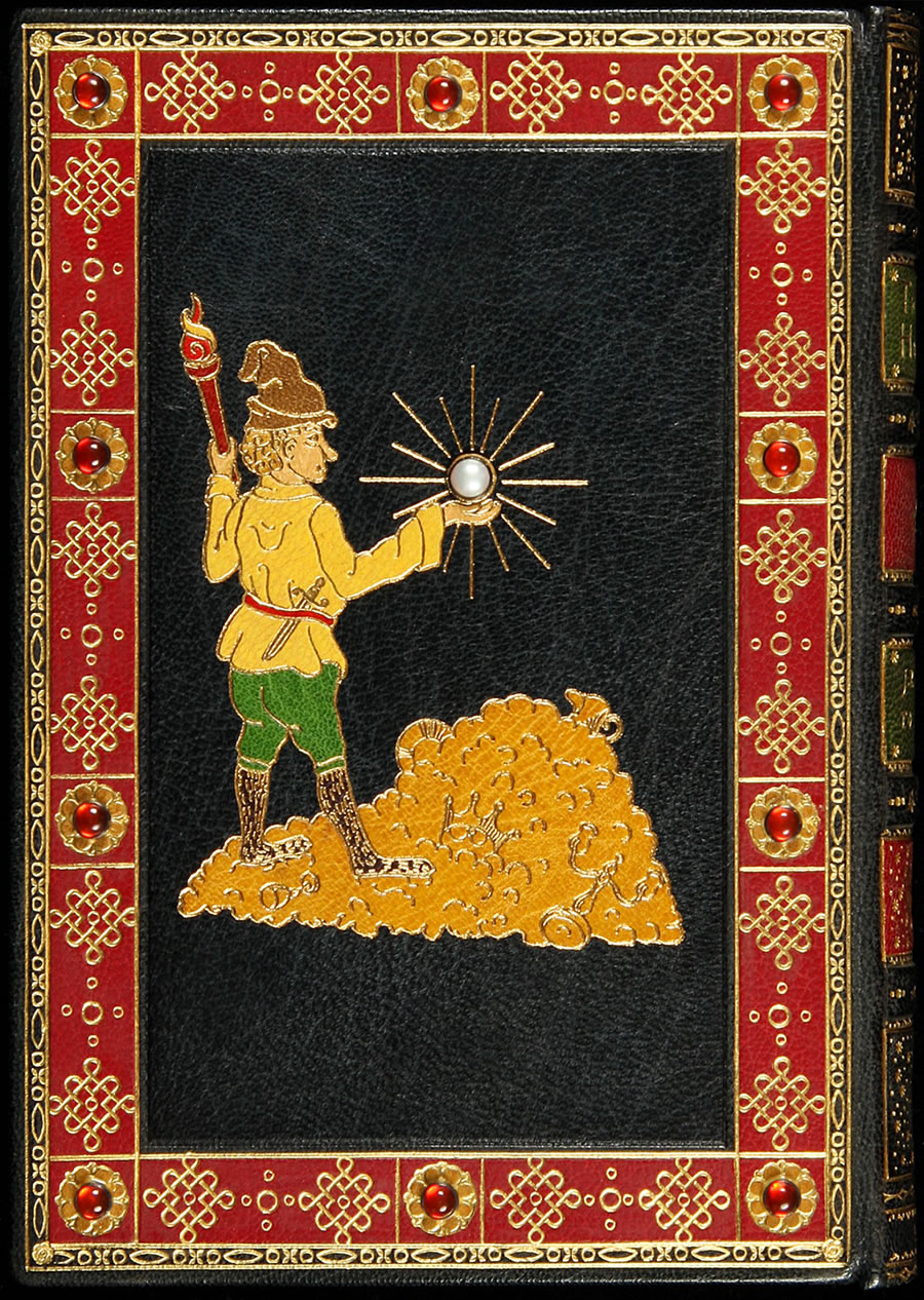 On the rear cover the Hobbit approaches the treasure, holding a torch and a pearl. Both covers have on-laid maroon and green borders decorated with Celtic interlace and lozenges in gilt, with 10 red jewels on small yellow floral on-lays.
