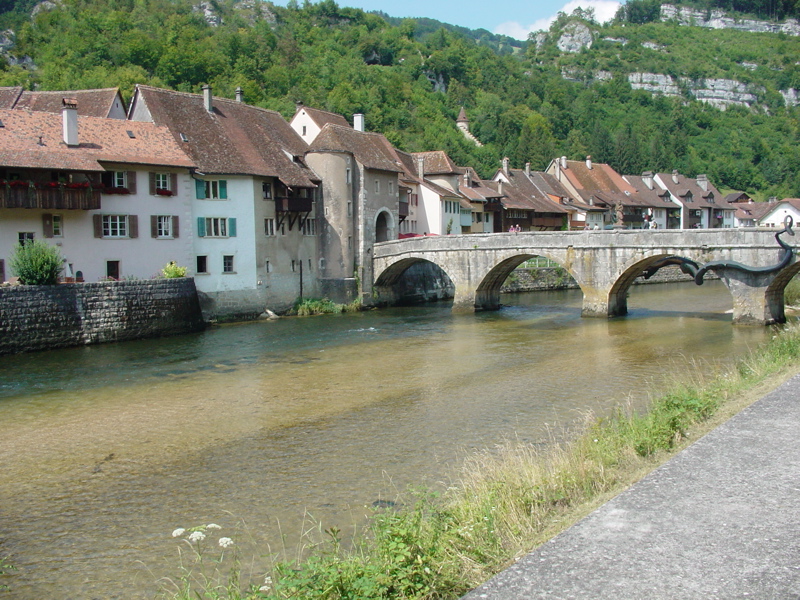 The bridge of Saint-Ursanne with a dragon
