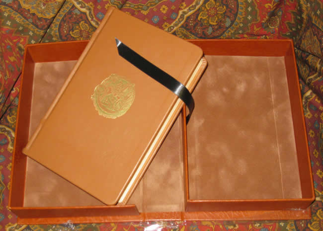 Fully bound in Brown Leather with matching full leather clamshell case, stamped in gold foil with a unique motif of Sigurd's horse, Grani.