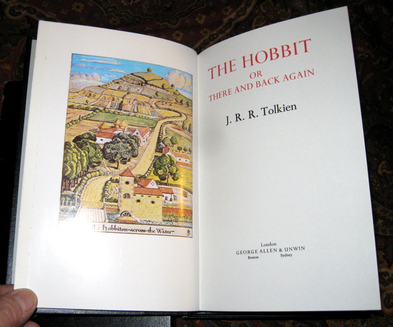 This copy is the 4th impression, published in 1986, of the 1st De Luxe Edition of 1976, with the Tolkien line drawings colorized by H. E. Riddett.