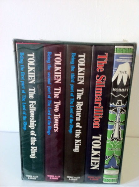 Like new, 1978 The Tolkien Library Boxed Set with The hobbit, the Lord of the Rings and The Silmarillion, still in publishers cellophane