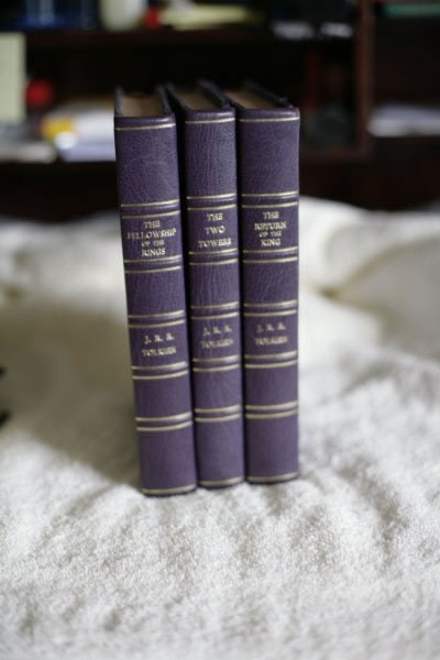 A Readers Union set (1960) rebound in purple cloth boards and purple leather spine and corners